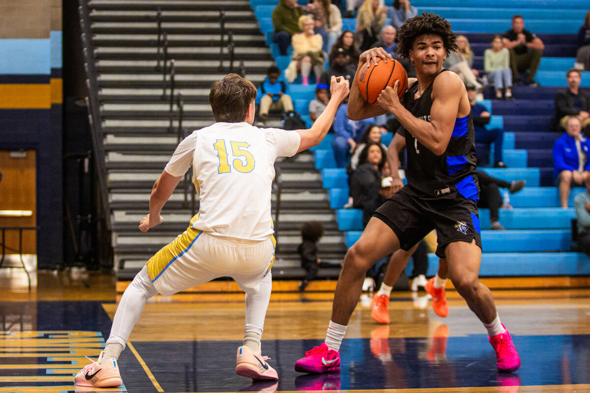 Democracy Prep guard Kaden Arnold (1) passes the ball during a basketball game between Democrac ...