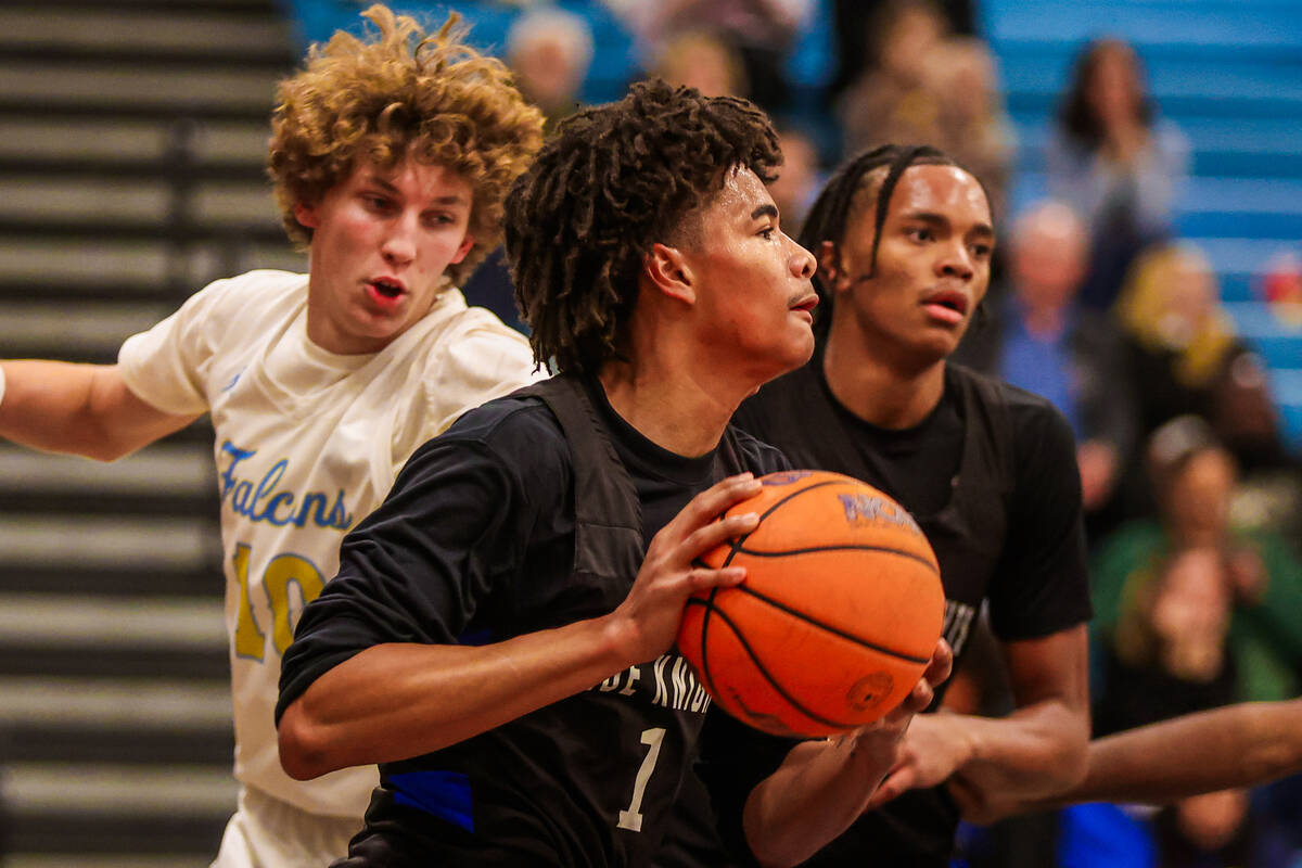 Democracy Prep guard Kaden Arnold (1) passes the ball during a basketball game between Democrac ...