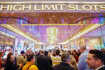 Attendees flood into the main entrance during the opening of the Durango hotel-casino high-limi ...