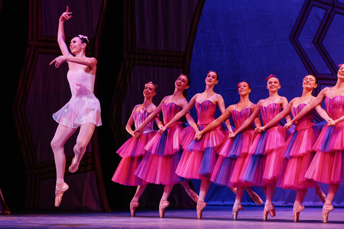 Christina Ghiardi dances as the Dewdrop amid several Flowers during the Nevada Ballet Theatre&# ...