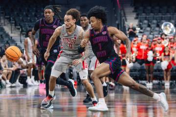 UNLV guard Dra Gibbs-Lawhorn (0) chases a loose ball during a college basketball game between U ...