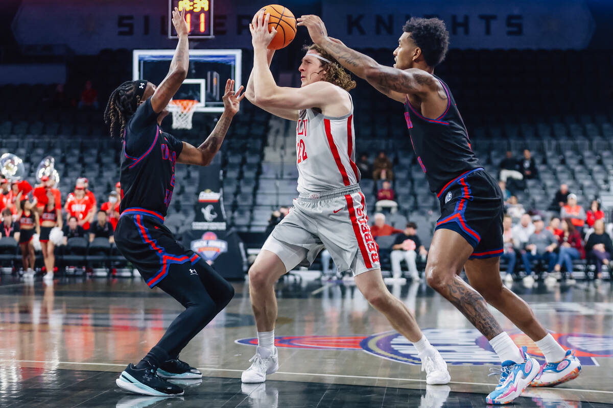 UNLV forward Walter Brown (22) looks for an open teammate during a college basketball game betw ...