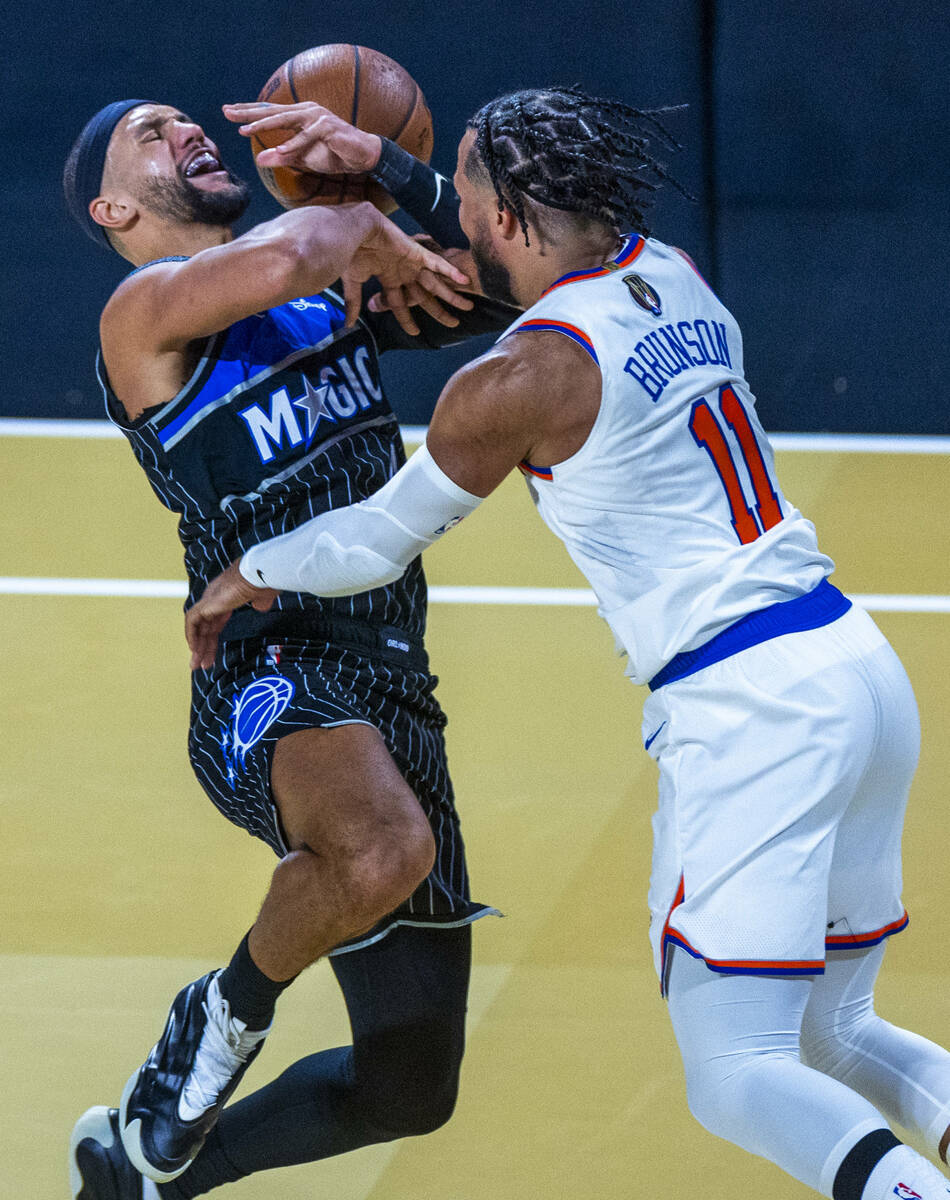 Orlando Magic center Wendell Carter Jr. (34) is fouled by New York Knicks guard Jalen Brunson ( ...