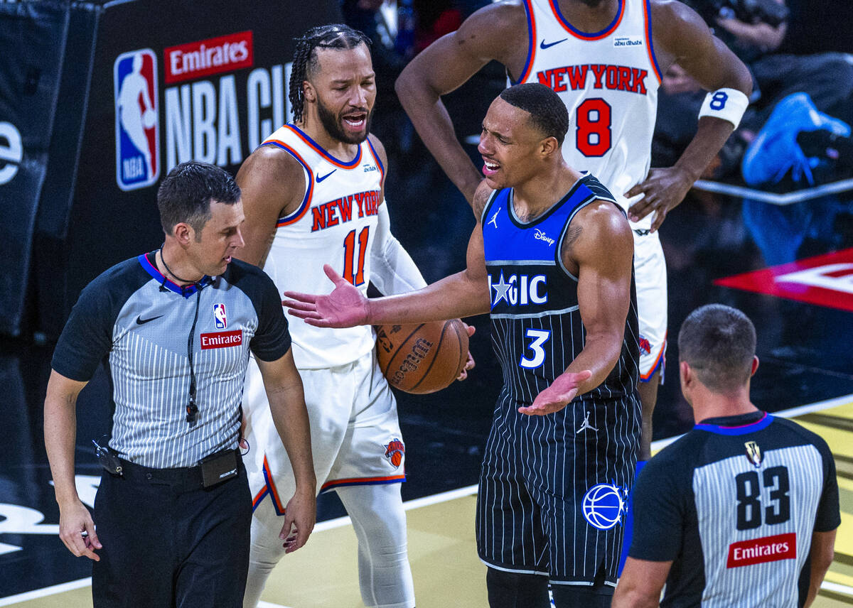 Orlando Magic guard Desmond Bane (3) argues a foul call as New York Knicks guard Jalen Brunson ...