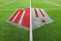 A Mountain West logo is seen on the field before an NCAA college football game between UNLV and ...
