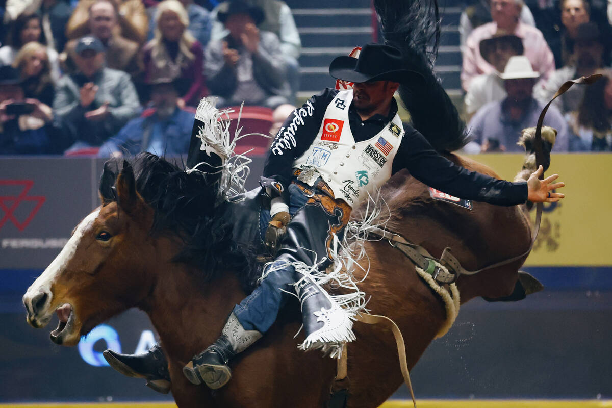 Mason Clements rides Game Trail for the bareback riding event in the 10th go-round of the Natio ...