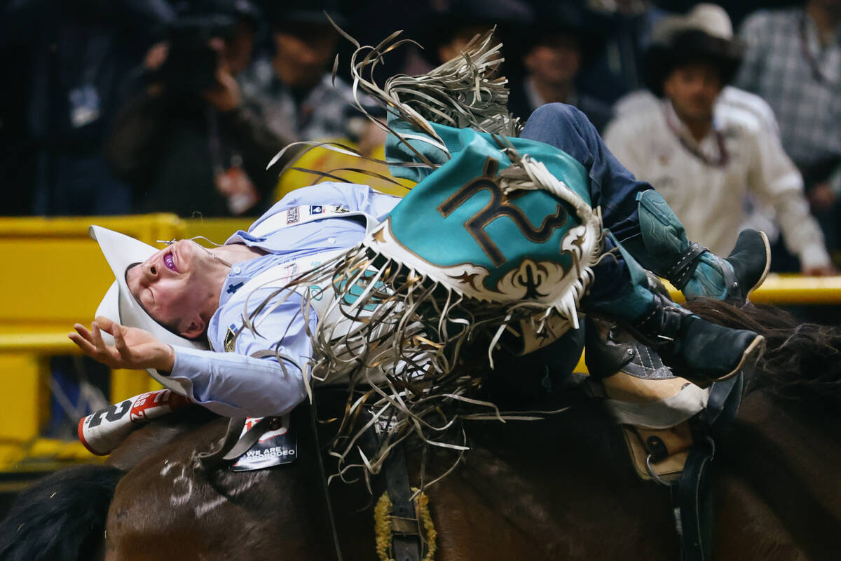 Sam Petersen rides Boot Barn’s Night Flight for the bareback riding event in the 10th go ...
