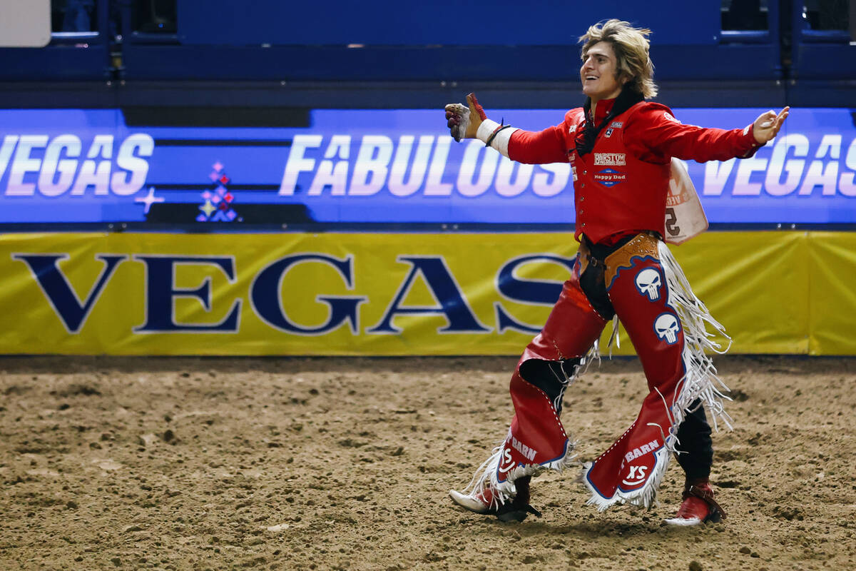 Rocker Steiner celebrates after riding Disco Party for the bareback riding event in the 10th go ...