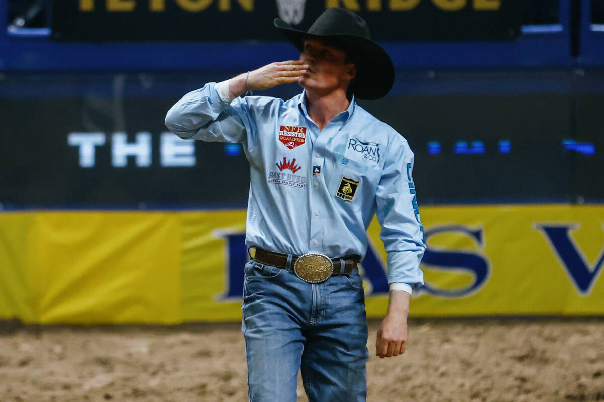 Tucker Allen blows a kiss to loved ones after competing in the steer wrestling event in the 10t ...