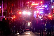Emergency personnel gather on Waterman Street at Brown University in Providence, R.I., on Satur ...