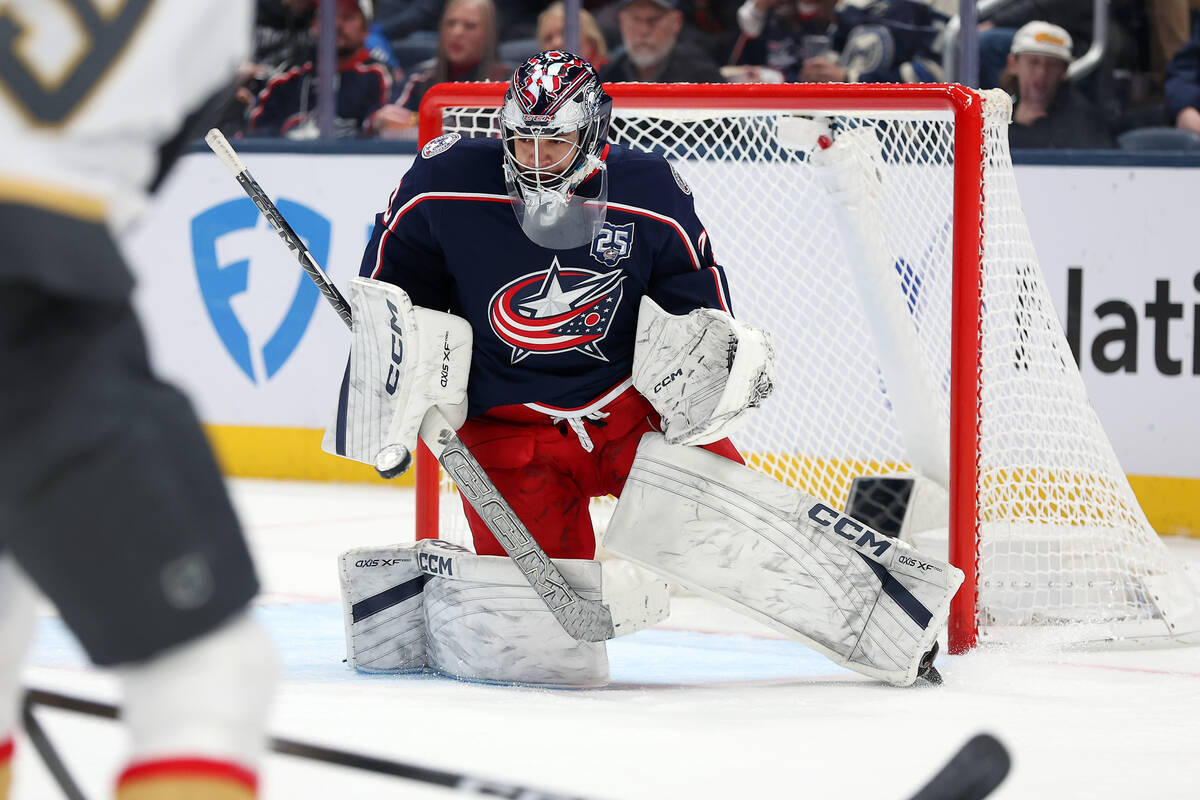 Columbus Blue Jackets goaltender Jet Greaves (73) saves the puck during the second period of an ...