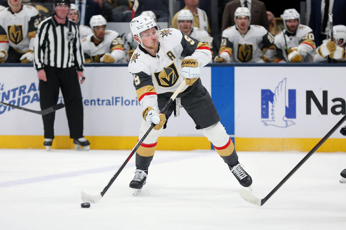 Vegas Golden Knights center Jack Eichel (9) looks to pass the puck during the second period of ...