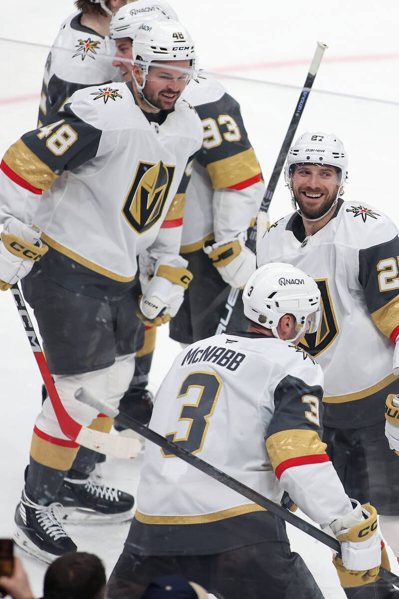 Vegas Golden Knights defenseman Brayden McNabb (3) celebrates his game winning goal with teamma ...