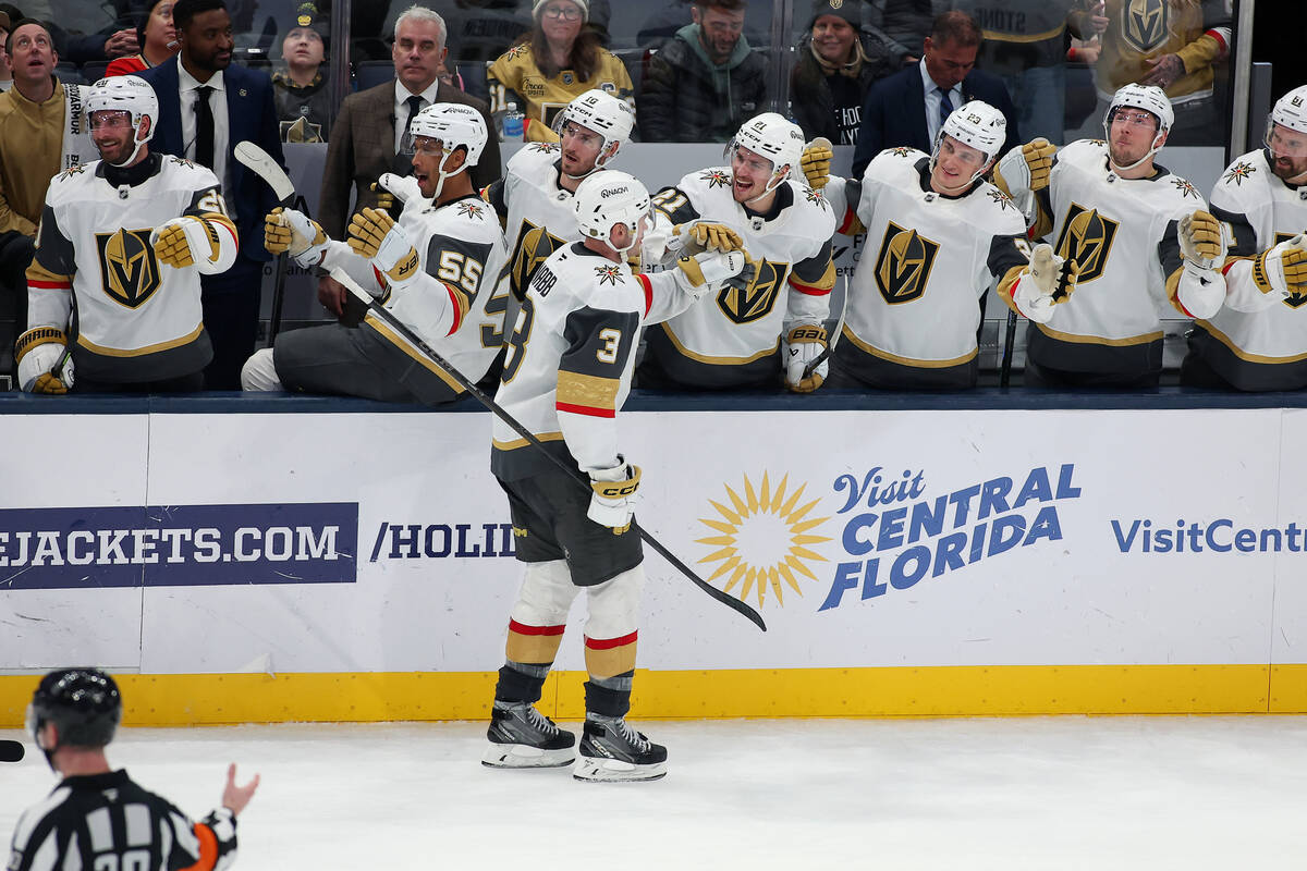 Vegas Golden Knights defenseman Brayden McNabb (3) celebrates his game winning goal with teamma ...