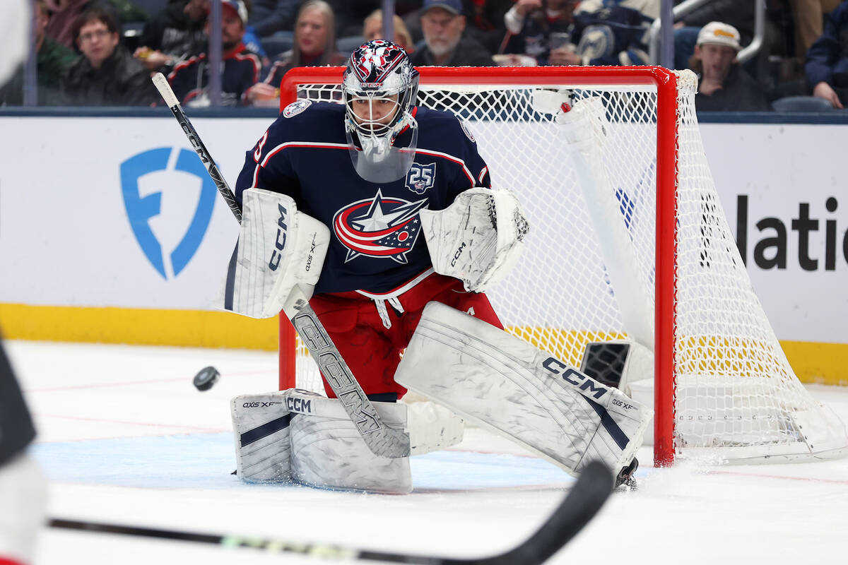 Columbus Blue Jackets goaltender Jet Greaves (73) saves the puck during the second period of an ...
