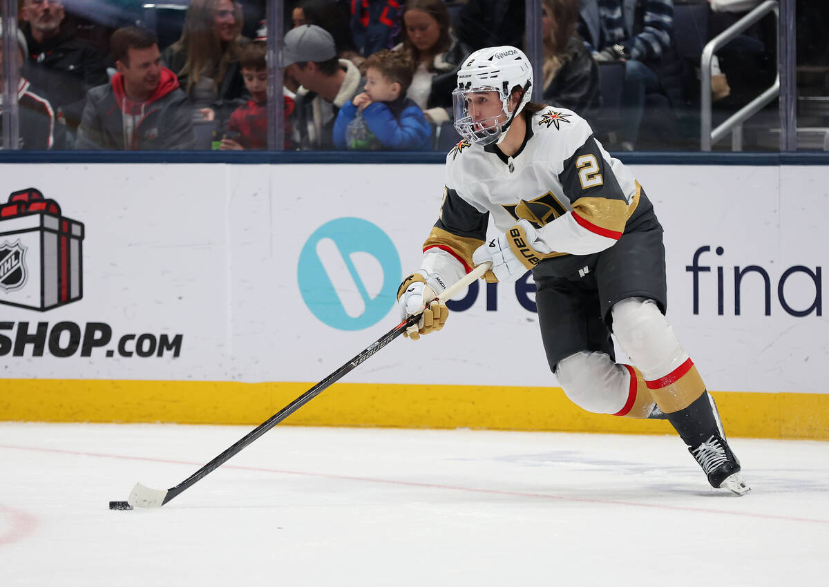 Vegas Golden Knights defenseman Zach Whitecloud (2) looks to pass the puck during the first per ...