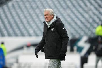 Las Vegas Raiders head coach Pete Carroll watches warm ups before an NFL football game against ...