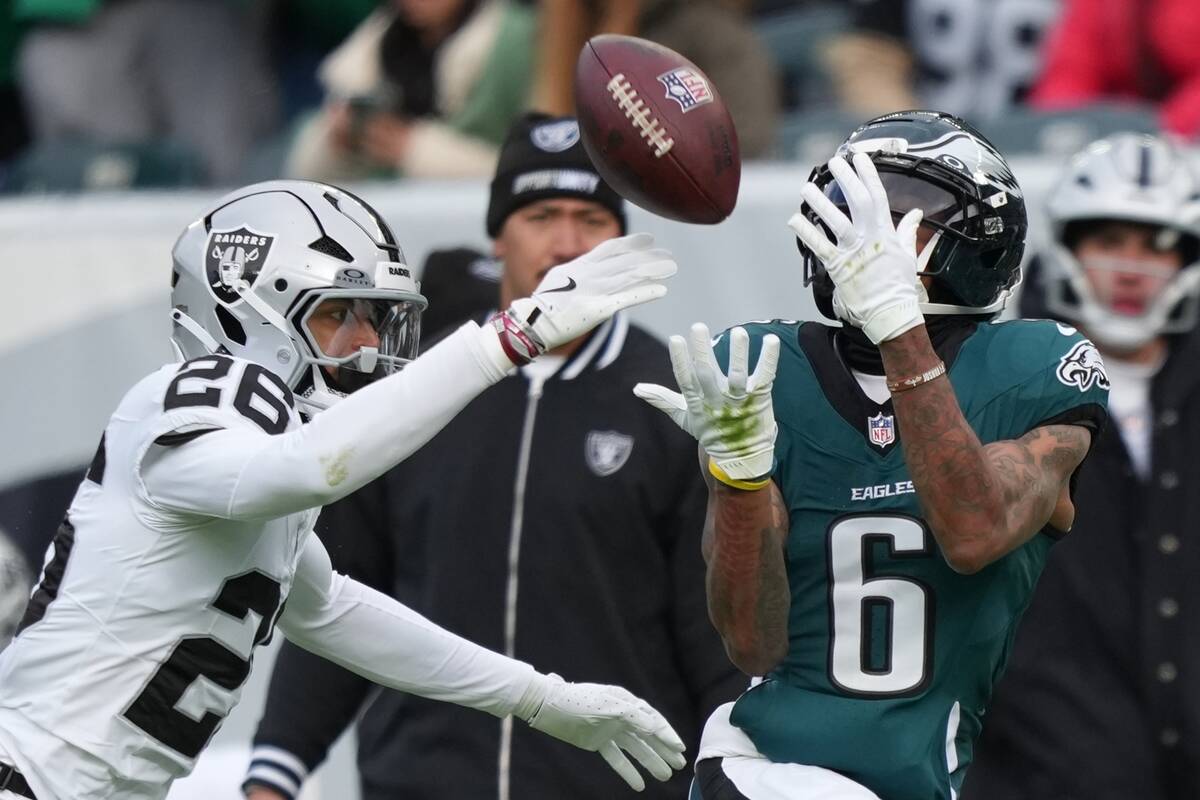 Philadelphia Eagles wide receiver Devonta Smith (6) catches a pass in front of Las Vegas Raider ...