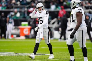 Las Vegas Raiders quarterback Kenny Pickett (15) reacts to an incomplete pass during the first ...