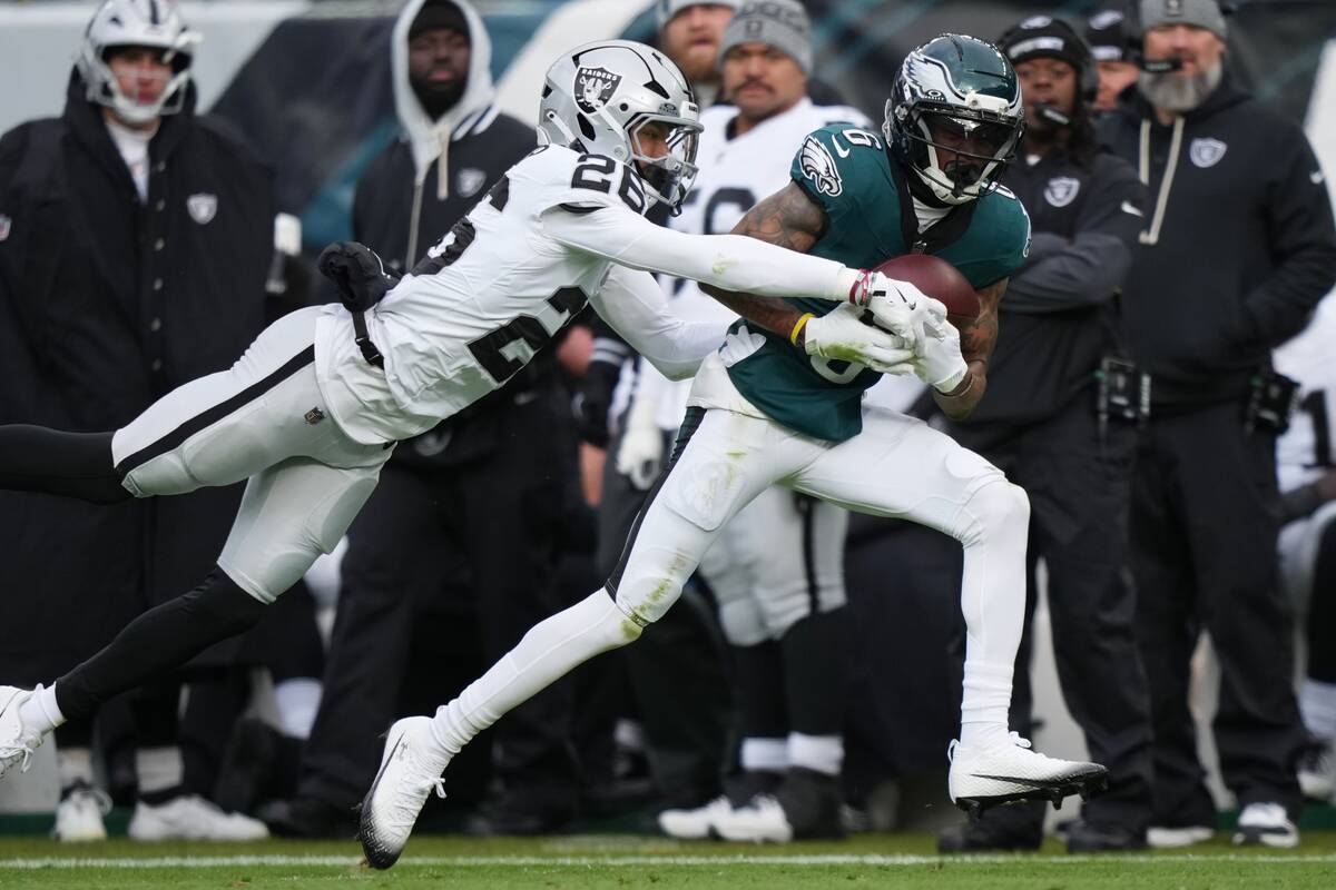 Philadelphia Eagles wide receiver Devonta Smith (6) catches a pass in front of Las Vegas Raider ...