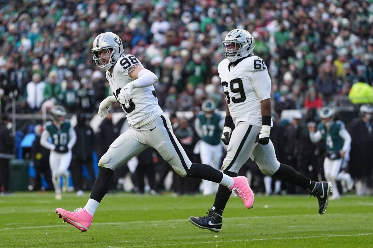 Las Vegas Raiders defensive end Maxx Crosby (98) celebrates after sacking Philadelphia Eagles q ...