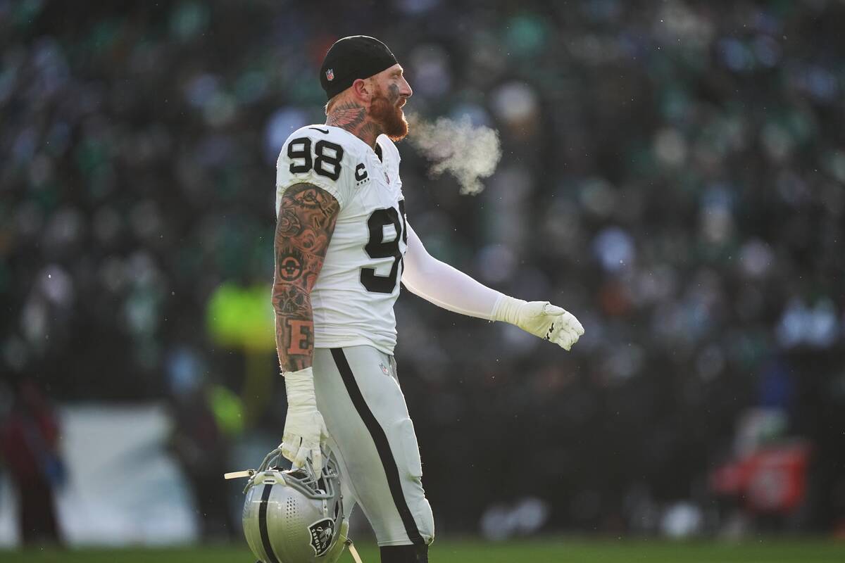Las Vegas Raiders defensive end Maxx Crosby (98) walks on the field during the first half of an ...