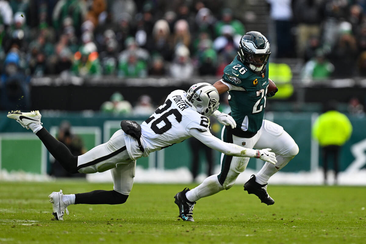 Philadelphia Eagles running back Saquon Barkley (26) runs the ball against Las Vegas Raiders co ...