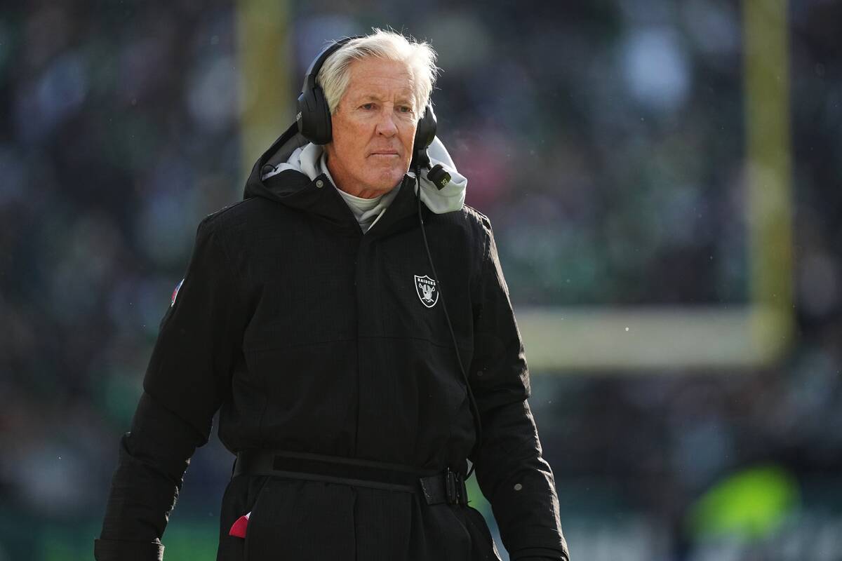 Las Vegas Raiders head coach Pete Carroll watches action during the first half of an NFL footba ...