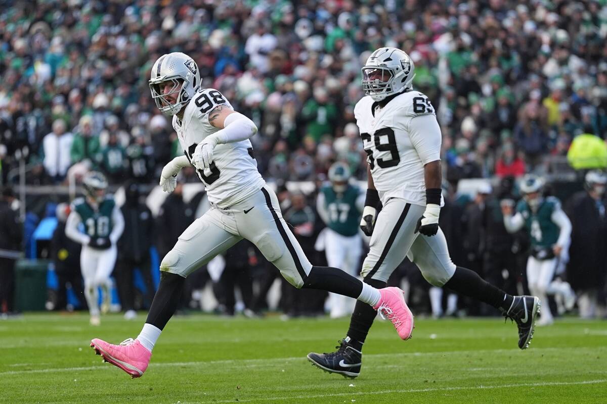 Las Vegas Raiders defensive end Maxx Crosby (98) celebrates after sacking Philadelphia Eagles q ...
