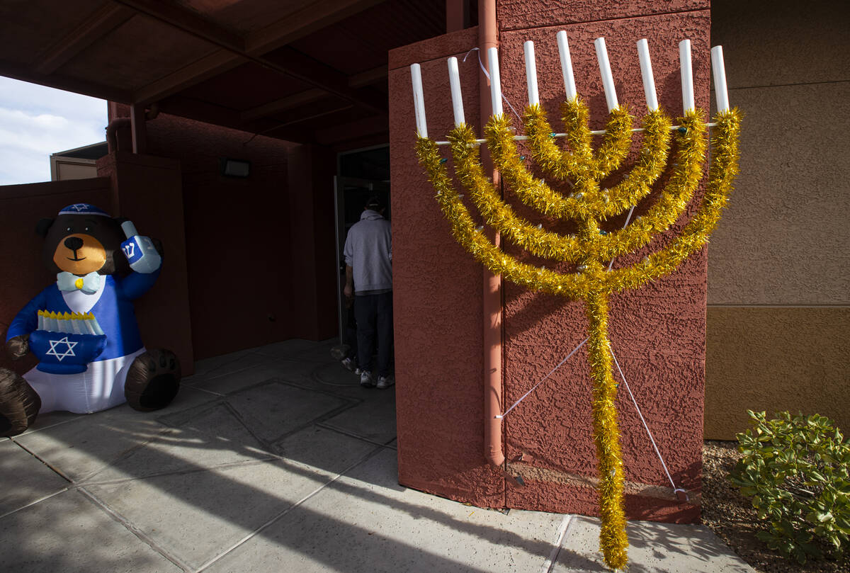 An oversized decorative menorah is seen outside of Zucker Jewish Academy on Sunday, Dec. 14, 20 ...