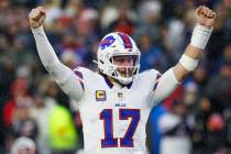 Buffalo Bills quarterback Josh Allen (17) reacts after throwing a touchdown during the second h ...