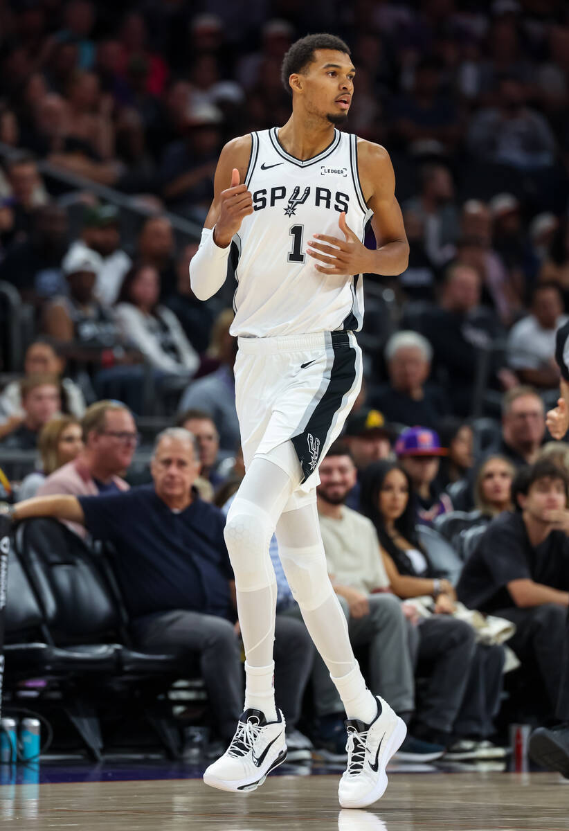 San Antonio Spurs forward Victor Wembanyama (1) looks on during the second half of an NBA baske ...