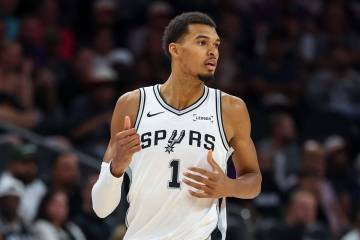 San Antonio Spurs forward Victor Wembanyama (1) looks on during the second half of an NBA baske ...