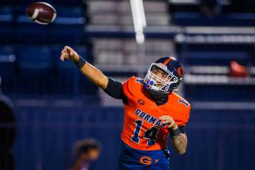 Bishop Gorman quarterback Maika Eugenio throws the ball during a Open Division high school foot ...