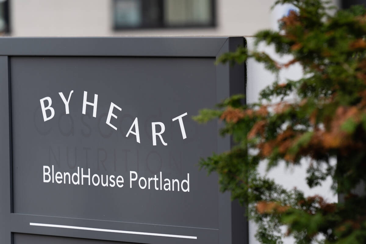 A sign for ByHeart, a manufacturer of organic baby formula, is displayed outside a building tha ...