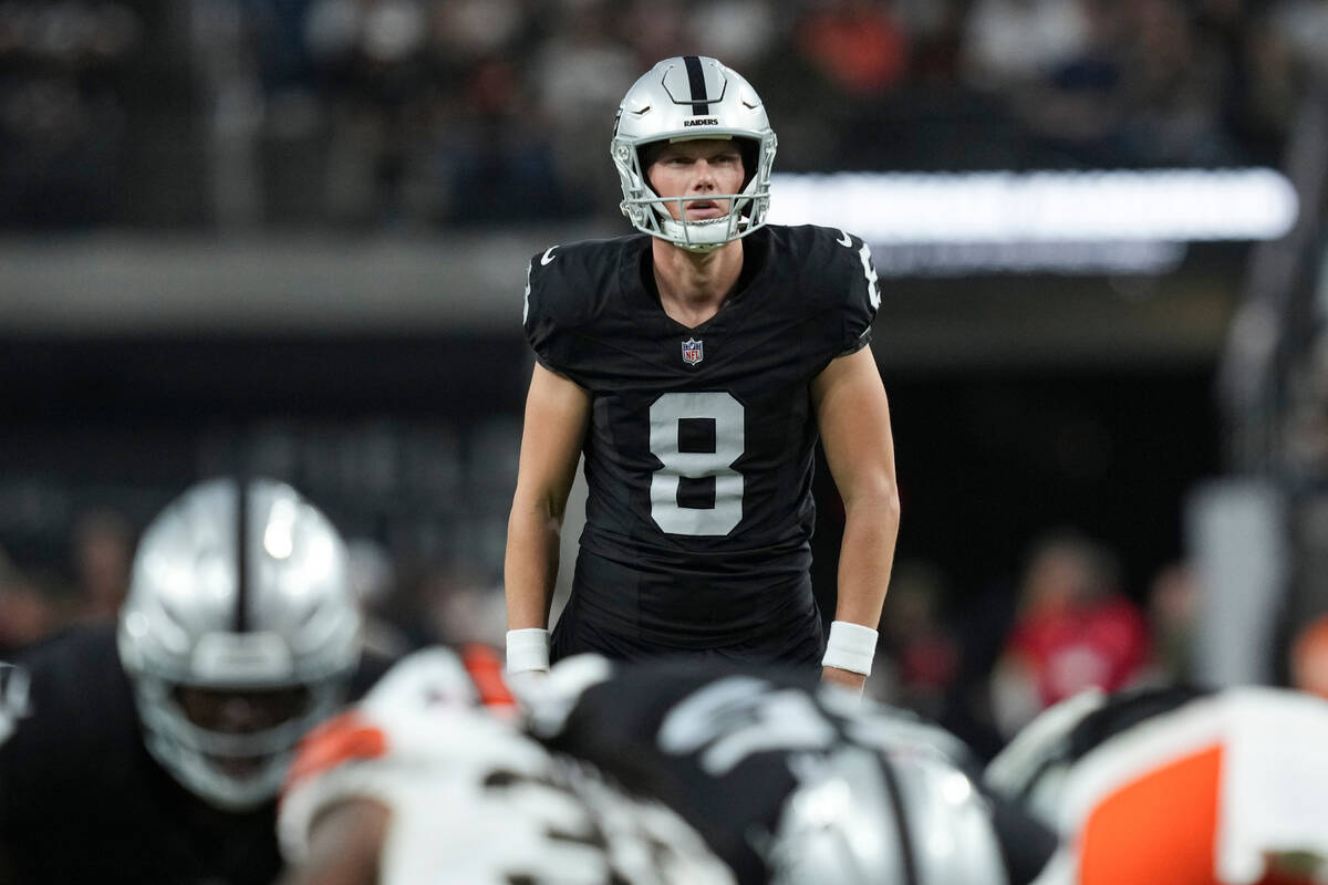 Las Vegas Raiders place kicker Daniel Carlson (8) lines up a field goal against the Cleveland B ...