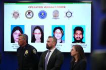 Photos of suspects of a terror plot are shown on a screen during a press conference Monday, Dec ...