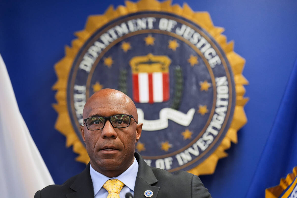 FBI Assistant Director in Charge Akil Davis announces developments on a terrorism investigation ...