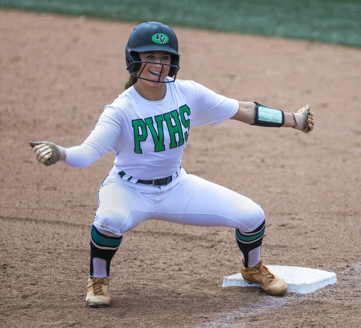 Palo Verde infielder Taylor Johns (11) does a little shimmy for teammates after arriving safely ...