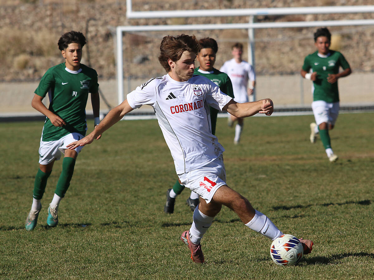 Coronado’s Gavin Flickinger looks to pass during the NIAA 5A state championship soccer g ...