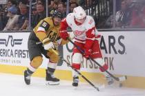Detroit Red Wings right wing Jonatan Berggren (48) and Golden Knights defenseman Jeremy Lauzon ...