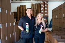 John-Paul and Erika Daluz owners of Stingray Clean stand for a portrait in their Las Vegas ware ...