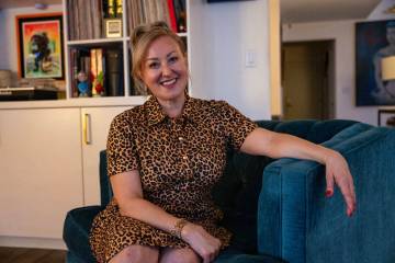 Natasha Pace, owner of Silver Lining Estate Services, sits for a portrait near her familyȁ ...