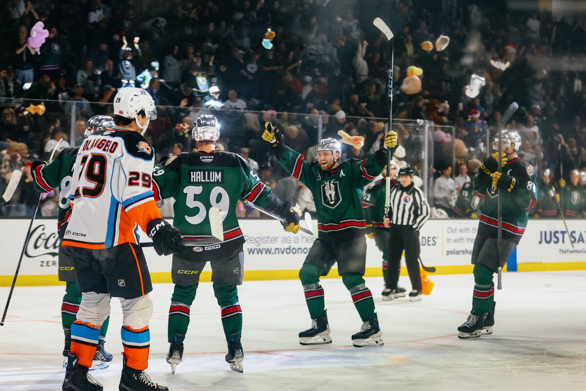 Toys start flying onto the rink after Silver Knights forward Riley McKay (89) scored the first ...