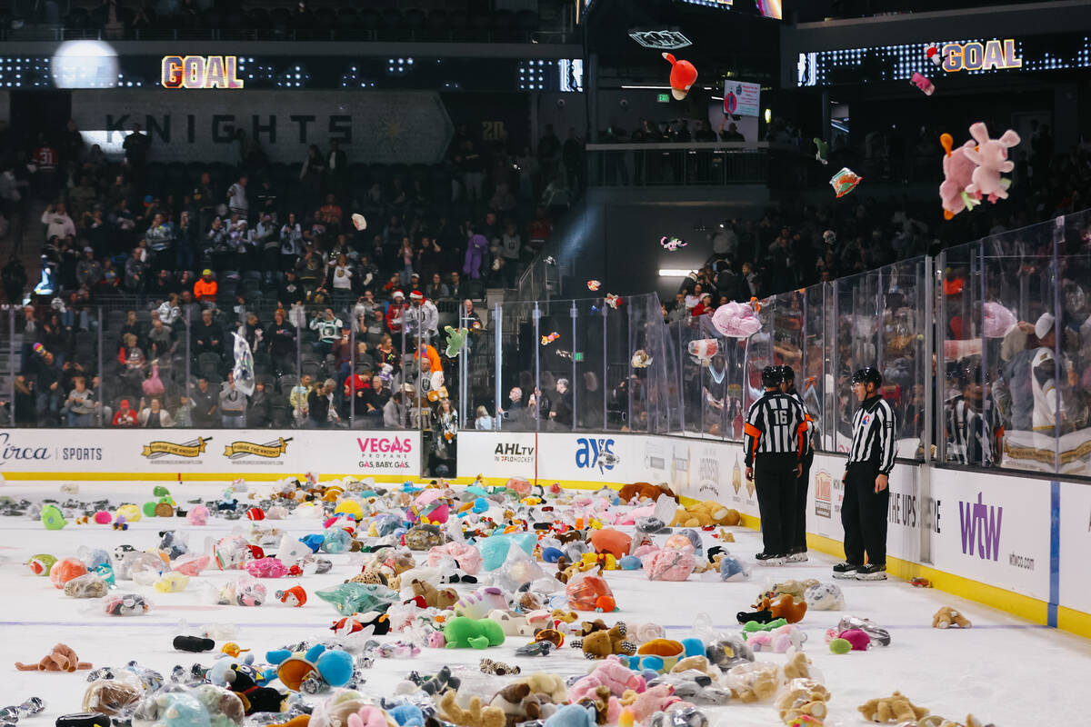 Toys start flying onto the rink after Silver Knights forward Riley McKay (89) scored the first ...