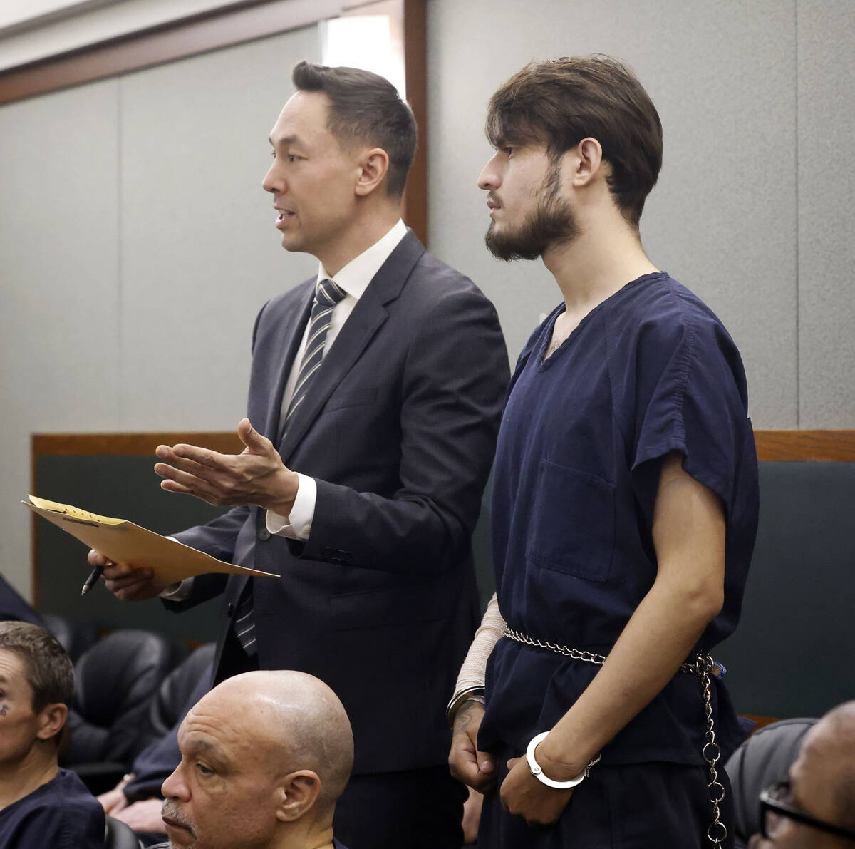 Jose Gutierrez, right, who is charged in connection with a 12-vehicle crash on Nov. 18 that cla ...