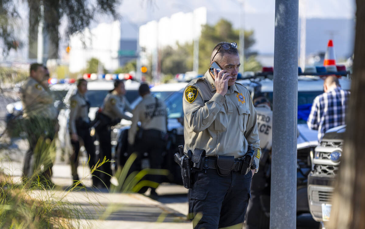 Metropolitan Police Department Undersheriff Andrew Walsh joins other officers along with North ...
