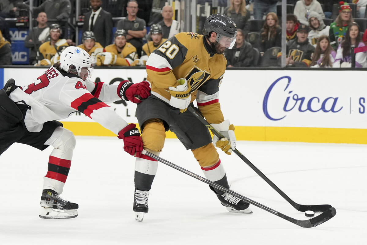 New Jersey Devils defenseman Luke Hughes (43) chases after Vegas Golden Knights left wing Brand ...