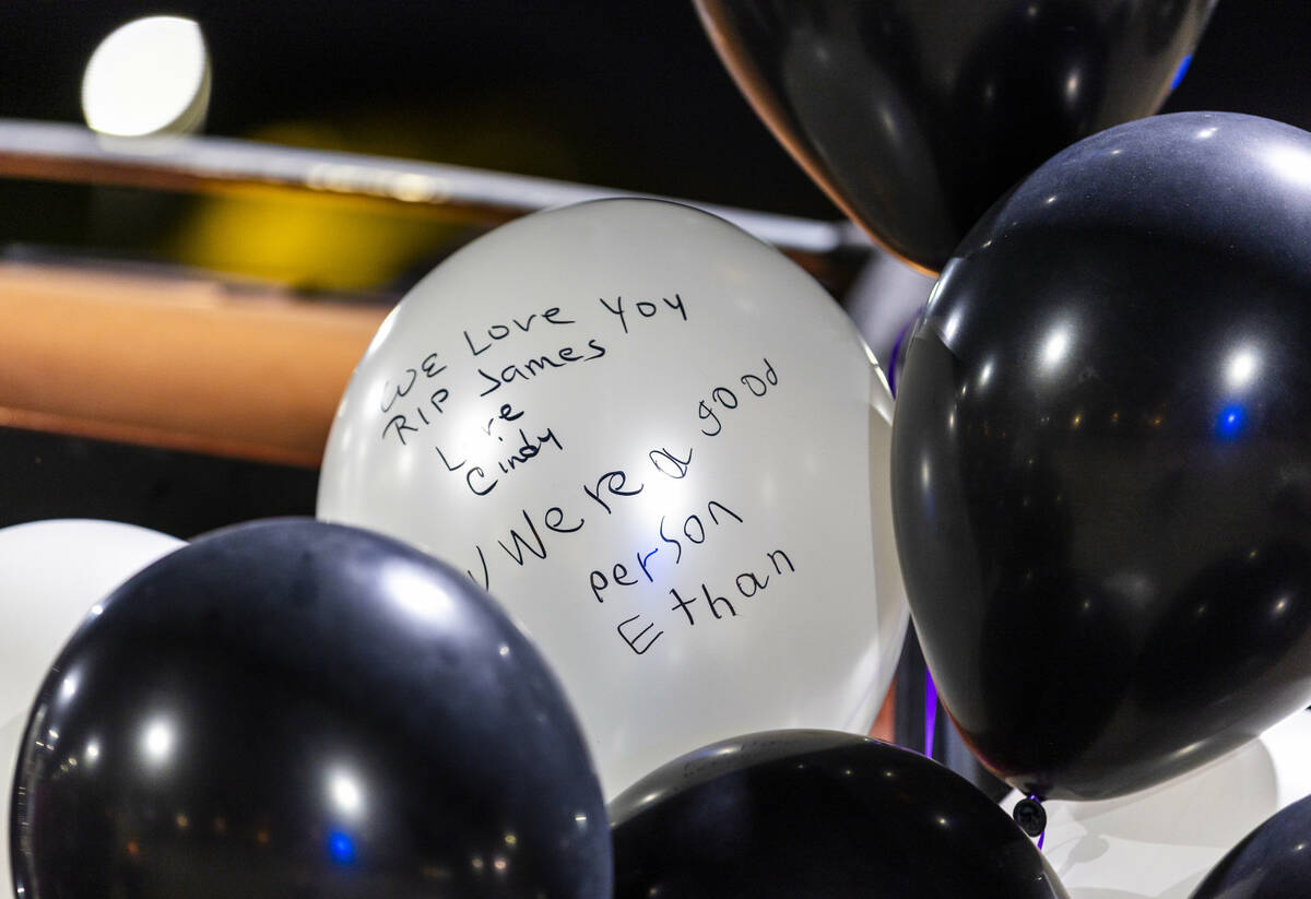 Balloons are adorned with well wishes as friends and family gather to recall the life of James ...
