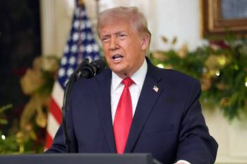 President Donald Trump speaks during an address to the nation from the Diplomatic Reception Roo ...